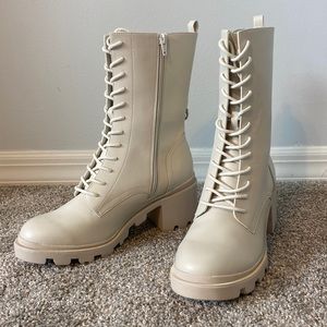 Beige combat boots, size 9. About 2.5 inch heal. Brand new and never worn!